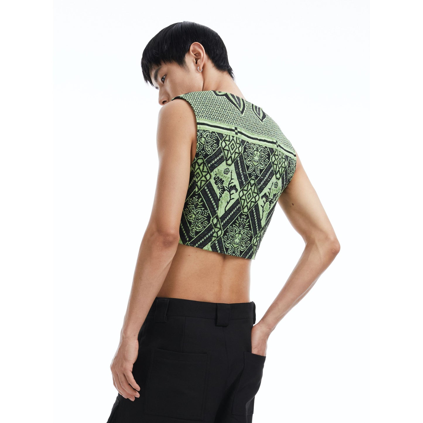 Green jacquard blanket vest.